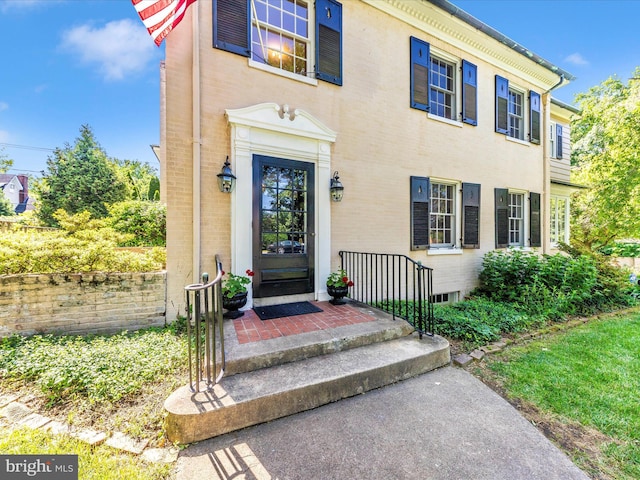 306 Grove Blvd, Frederick, MD 21701 - doorway to property featuring brick siding