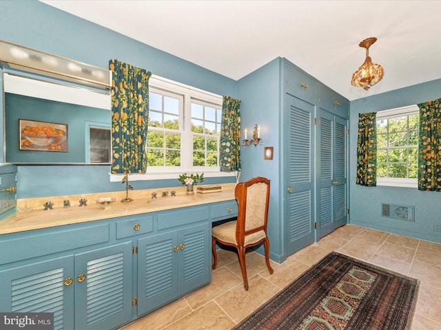 306 Grove Blvd, Frederick, MD 21701 - bathroom with a closet, double vanity, and tile patterned floors