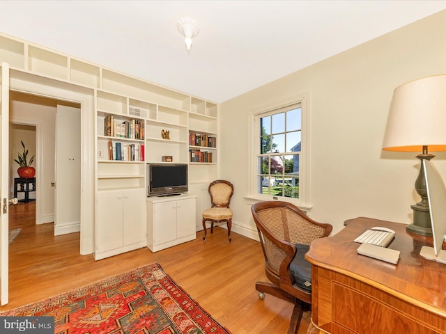 306 Grove Blvd, Frederick, MD 21701 - home office with light wood-type flooring and built in features