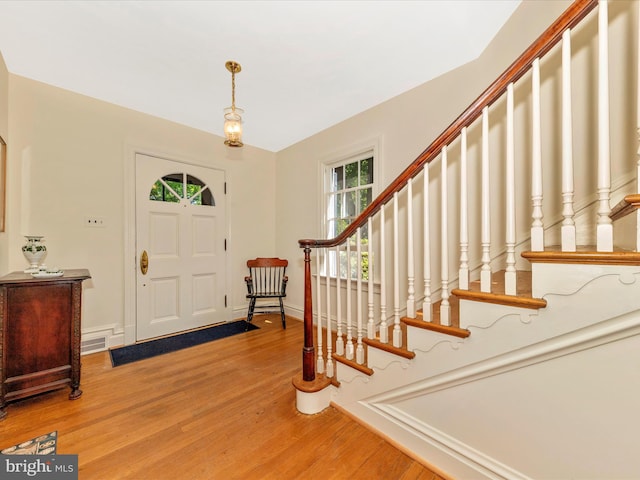 306 Grove Blvd, Frederick, MD 21701 - entrance foyer with light wood-type flooring, healthy amount of natural light, and stairs