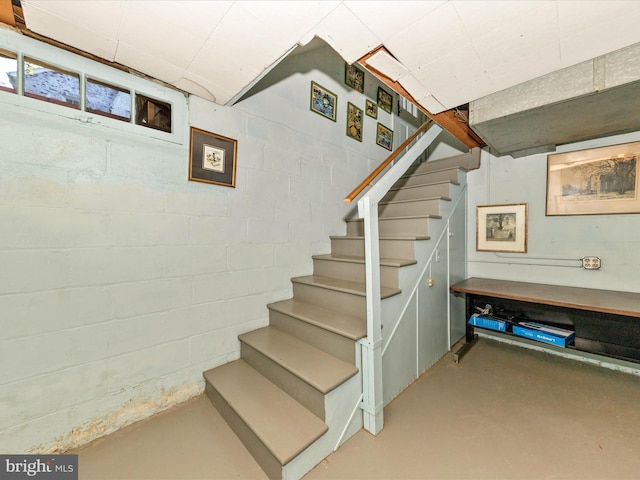 306 Grove Blvd, Frederick, MD 21701 - stairway with finished concrete flooring and concrete block wall