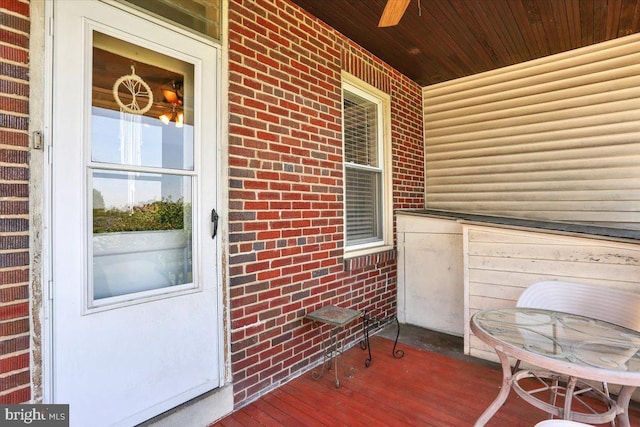 3314 Orchard Pl, Reading, PA 19605 - view of exterior entry with brick siding, a porch, and a ceiling fan