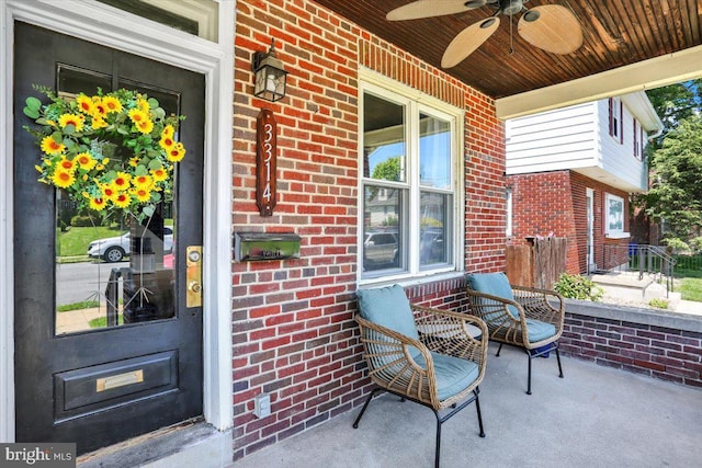 3314 Orchard Pl, Reading, PA 19605 - view of exterior entry with brick siding, a porch, and ceiling fan