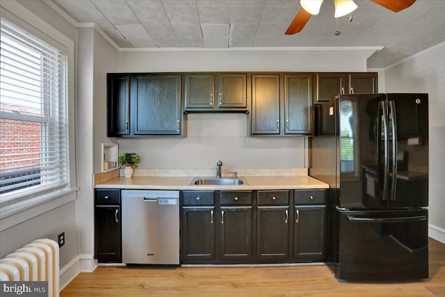 3314 Orchard Pl, Reading, PA 19605 - kitchen with dishwasher, freestanding refrigerator, radiator, crown molding, and a ceiling fan