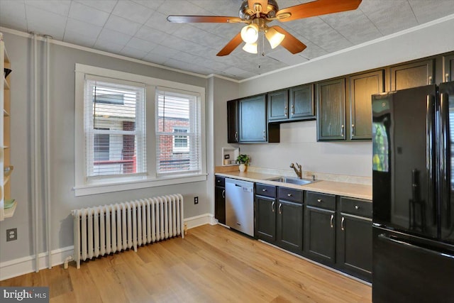 3314 Orchard Pl, Reading, PA 19605 - kitchen featuring freestanding refrigerator, radiator heating unit, dishwasher, ornamental molding, and light wood-style flooring