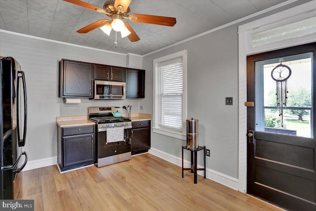 3314 Orchard Pl, Reading, PA 19605 - kitchen with appliances with stainless steel finishes, ornamental molding, light countertops, light wood-style floors, and ceiling fan