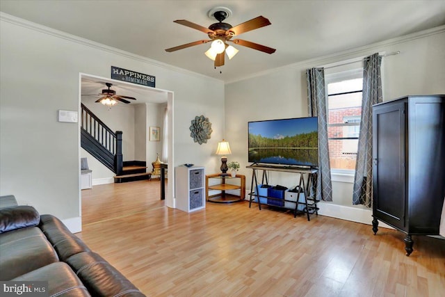 3314 Orchard Pl, Reading, PA 19605 - living room featuring a ceiling fan, stairway, light wood finished floors, and ornamental molding