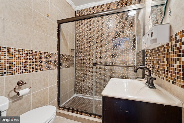 3006 Cedar St, Philadelphia, PA 19134 - bathroom featuring tile walls, a shower stall, vanity, and ornamental molding