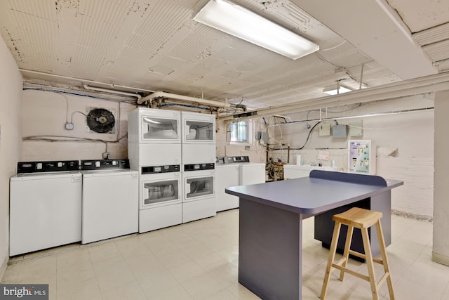 1833 S St NW Unit 2, Washington, DC 20009 - shared laundry featuring stacked washer / drying machine and washer and clothes dryer