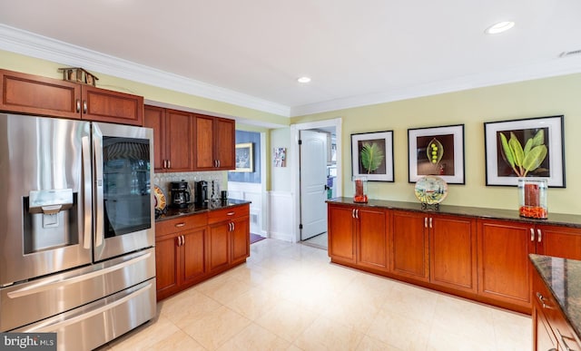 1421 Custom House Sq, Bensalem, PA 19020 - kitchen featuring stainless steel fridge, ornamental molding, dark stone counters, backsplash, and brown cabinetry