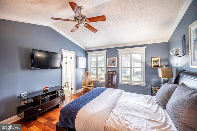 1421 Custom House Sq, Bensalem, PA 19020 - bedroom with a textured ceiling, ornamental molding, vaulted ceiling, wood finished floors, and a ceiling fan