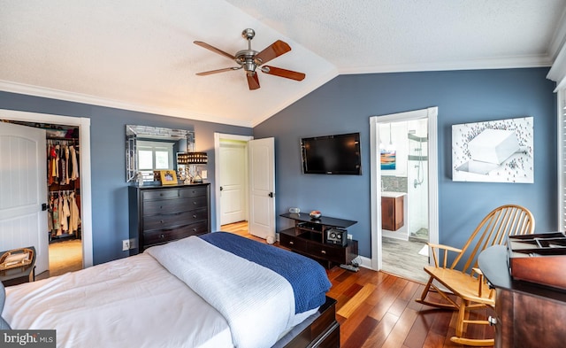 1421 Custom House Sq, Bensalem, PA 19020 - bedroom with wood finished floors, a spacious closet, crown molding, lofted ceiling, and a closet