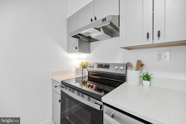 5500 Holmes Run Pkwy Unit 1103, Alexandria, VA 22304 - kitchen with stainless steel range with electric stovetop, under cabinet range hood, light stone counters, and white cabinets