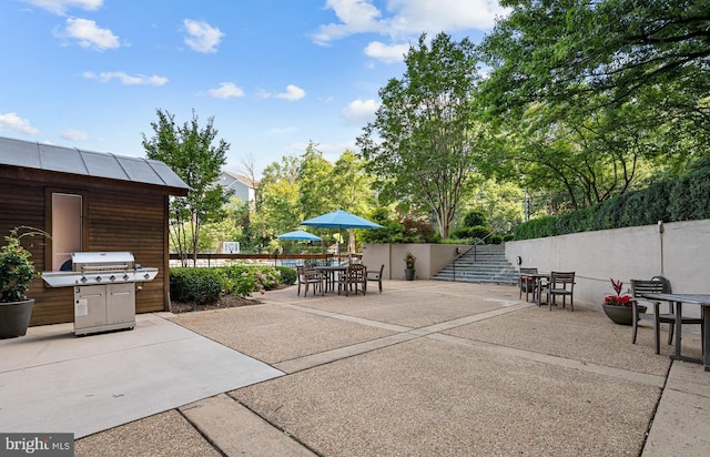 5500 Holmes Run Pkwy Unit 1103, Alexandria, VA 22304 - view of patio / terrace with outdoor dining space and stairway