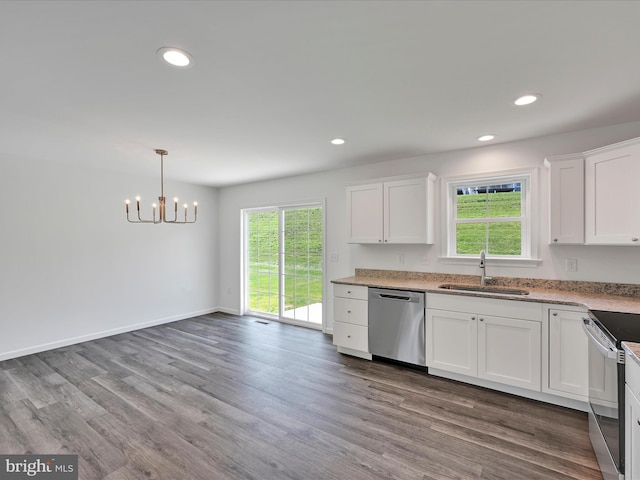 564 Monocacy Trl, Spring Grove, PA 17362 - kitchen with appliances with stainless steel finishes, a chandelier, white cabinetry, wood finished floors, and recessed lighting