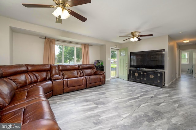 616 Dartmouth Ave, Cinnaminson, NJ 08077 - living area with a ceiling fan and baseboards