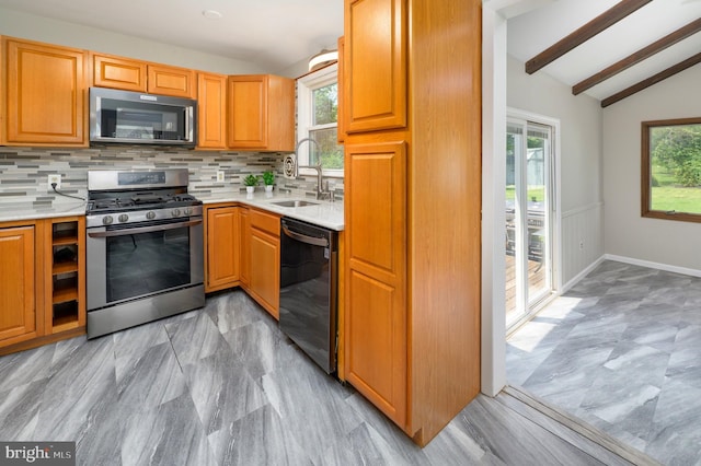 616 Dartmouth Ave, Cinnaminson, NJ 08077 - kitchen featuring stainless steel range with gas cooktop, dishwashing machine, backsplash, and plenty of natural light