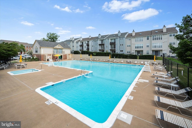 119 Prosperity Ave SE Unit C, Leesburg, VA 20175 - community pool featuring a patio
