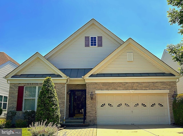 9 Clancy Ct, Marlton, NJ 08053 - view of front of property featuring a standing seam roof, brick siding, an attached garage, concrete driveway, and a metal roof