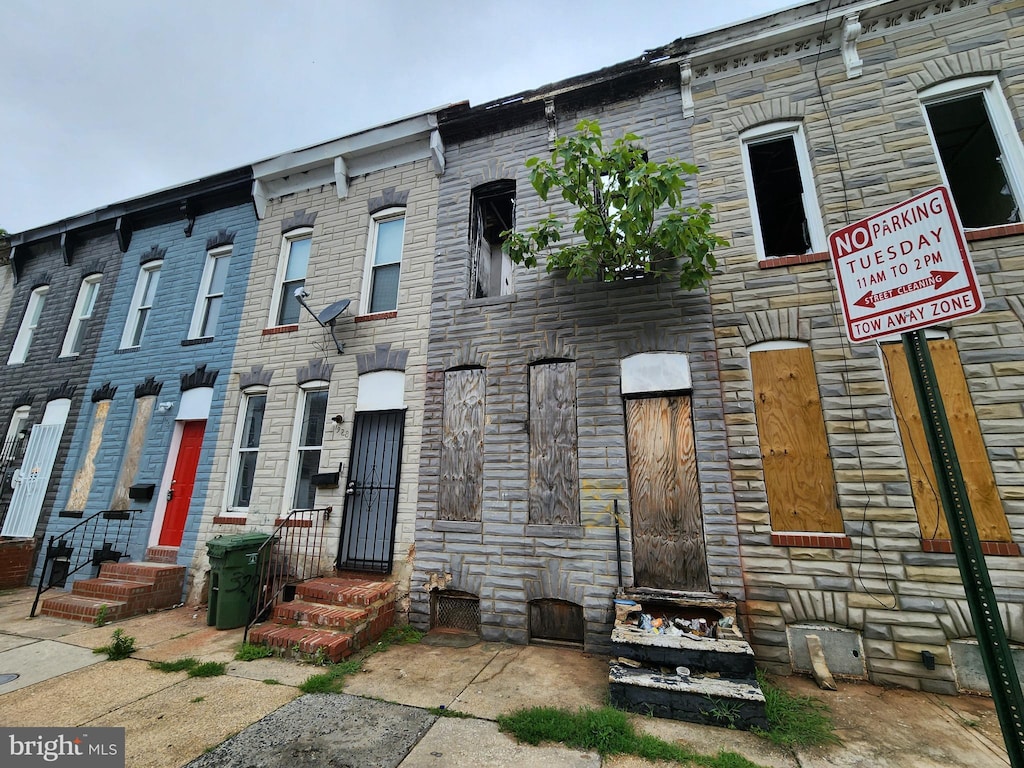 1926 Christian St, Baltimore, MD 21223 - multi unit property featuring stone siding