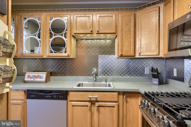 420 Buttonwood Ln Unit 420A, York, PA 17406 - kitchen featuring stainless steel appliances, light countertops, tasteful backsplash, and glass insert cabinets
