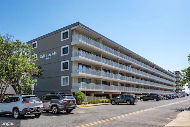 4 46th St Unit 101, Ocean City, MD 21842 - view of apartment building / complex featuring uncovered parking