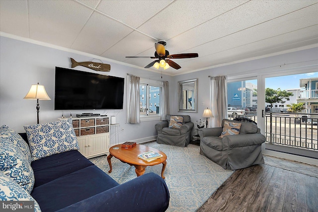 4 46th St Unit 101, Ocean City, MD 21842 - living room featuring crown molding, wood finished floors, plenty of natural light, and ceiling fan