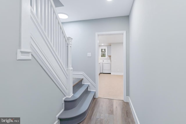 664 Poplar St, Lancaster, PA 17603 - stairway with washer and clothes dryer and wood finished floors