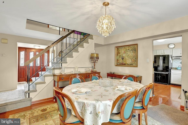 78 Kent Ave, Marlton, NJ 08053 - dining room featuring stairs, light wood-style floors, and a chandelier