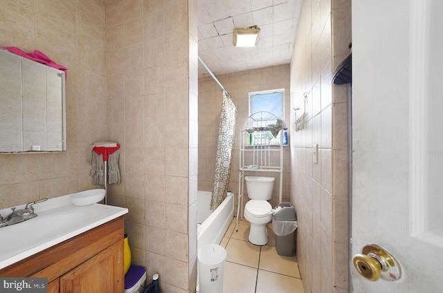 8 James St, New Brunswick, NJ 08901 - full bath with tile walls, shower / bathtub combination with curtain, vanity, and tile patterned flooring
