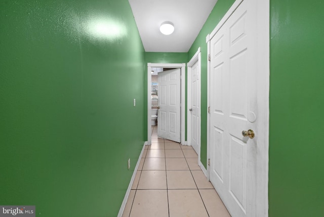 8 James St, New Brunswick, NJ 08901 - hallway featuring light tile patterned floors and baseboards