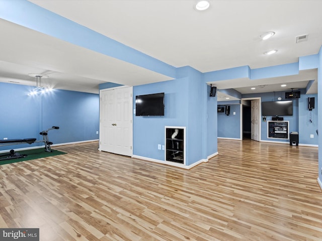 1505 Ridge Forest Way, Hanover, MD 21076 - unfurnished living room with baseboards and light wood-type flooring