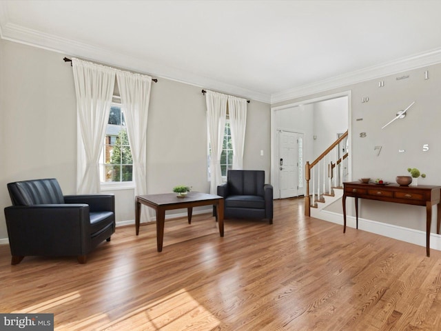1505 Ridge Forest Way, Hanover, MD 21076 - living area featuring crown molding, healthy amount of natural light, light wood-type flooring, and stairway