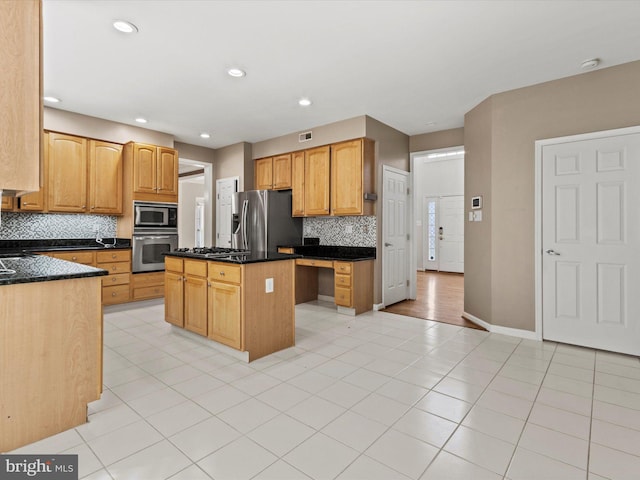 1505 Ridge Forest Way, Hanover, MD 21076 - kitchen with stainless steel appliances, decorative backsplash, a kitchen island, light tile patterned flooring, and recessed lighting