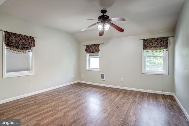 328 E Logan St, Bellefonte, PA 16823 - empty room featuring wood finished floors, ceiling fan, lofted ceiling, and heating unit