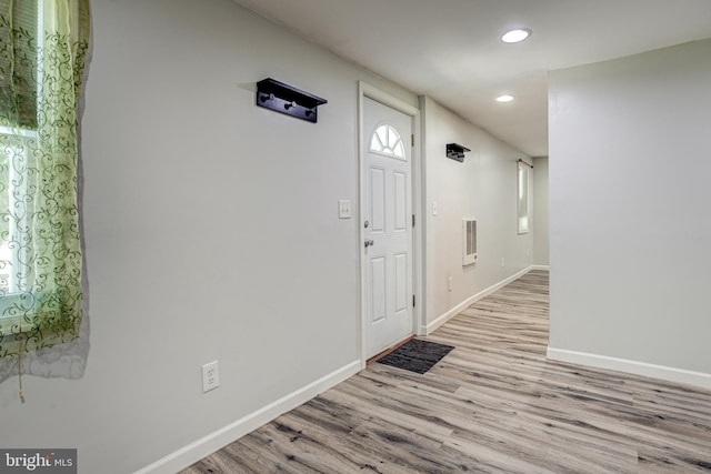 328 E Logan St, Bellefonte, PA 16823 - entrance foyer featuring wood finished floors, recessed lighting, and heating unit
