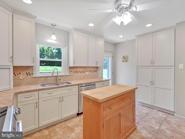 1402 Springside Dr, Lancaster, PA 17603 - kitchen with stainless steel appliances, wood counters, backsplash, ceiling fan, and light tile patterned flooring