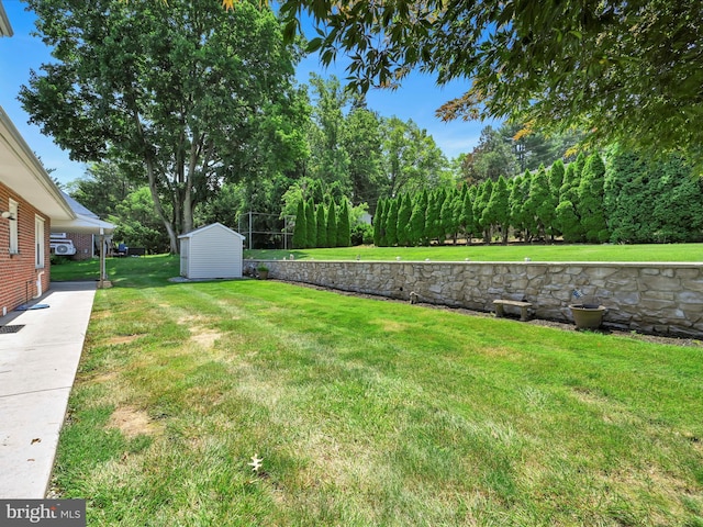 1402 Springside Dr, Lancaster, PA 17603 - view of grassy yard with a storage shed and view of scattered trees
