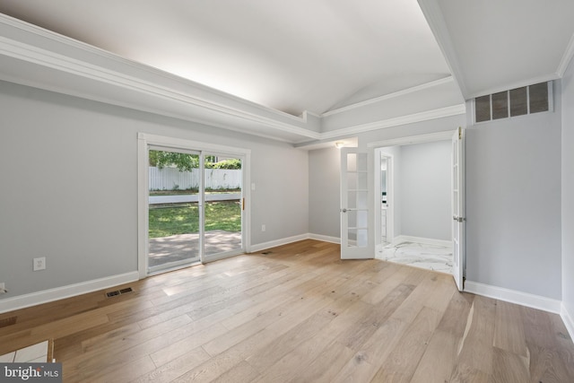 11704 Milbern Dr, Potomac, MD 20854 - unfurnished room featuring french doors, vaulted ceiling, and light wood-style floors