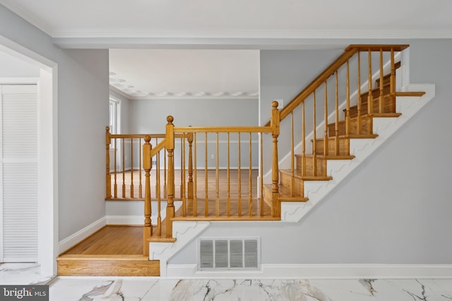 11704 Milbern Dr, Potomac, MD 20854 - staircase featuring crown molding and baseboards