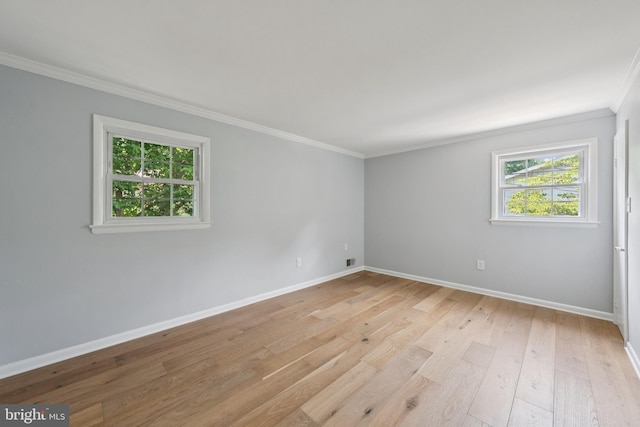 11704 Milbern Dr, Potomac, MD 20854 - empty room featuring crown molding and light wood-style floors
