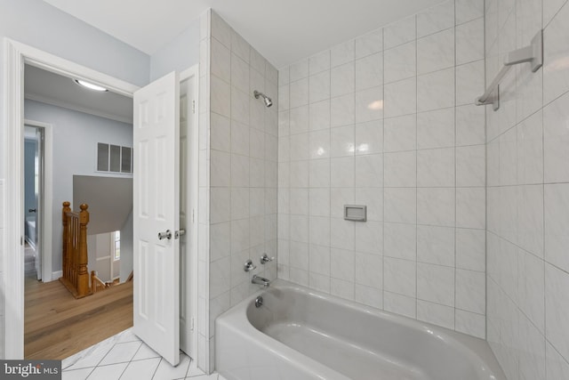 11704 Milbern Dr, Potomac, MD 20854 - full bath featuring shower / bath combination and wood finished floors