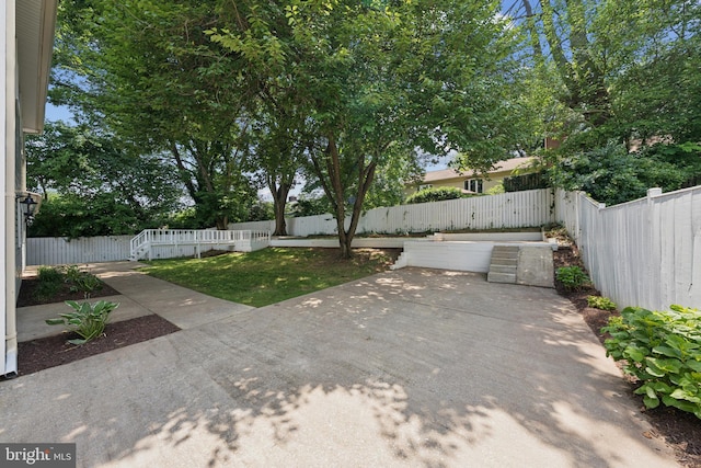 11704 Milbern Dr, Potomac, MD 20854 - fenced yard featuring a patio area