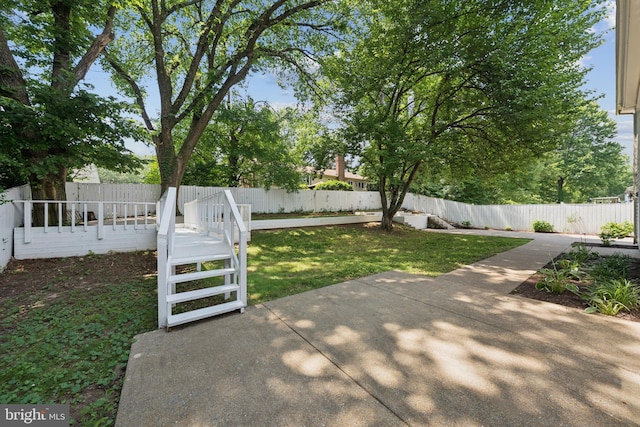 11704 Milbern Dr, Potomac, MD 20854 - fenced backyard with a patio