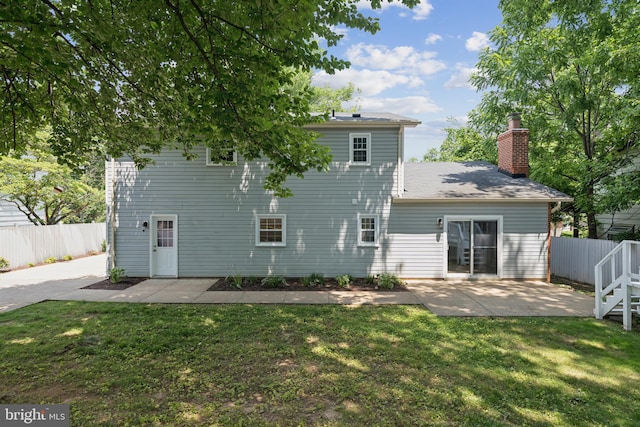 11704 Milbern Dr, Potomac, MD 20854 - back of house with a patio and a chimney