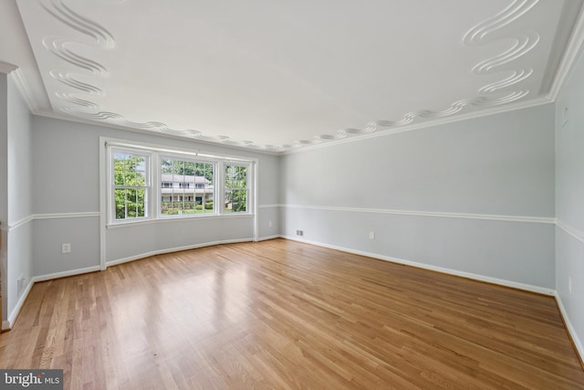 11704 Milbern Dr, Potomac, MD 20854 - unfurnished room featuring light wood-type flooring and ornamental molding