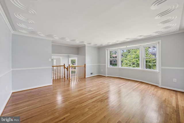 11704 Milbern Dr, Potomac, MD 20854 - empty room with wood finished floors and ornamental molding