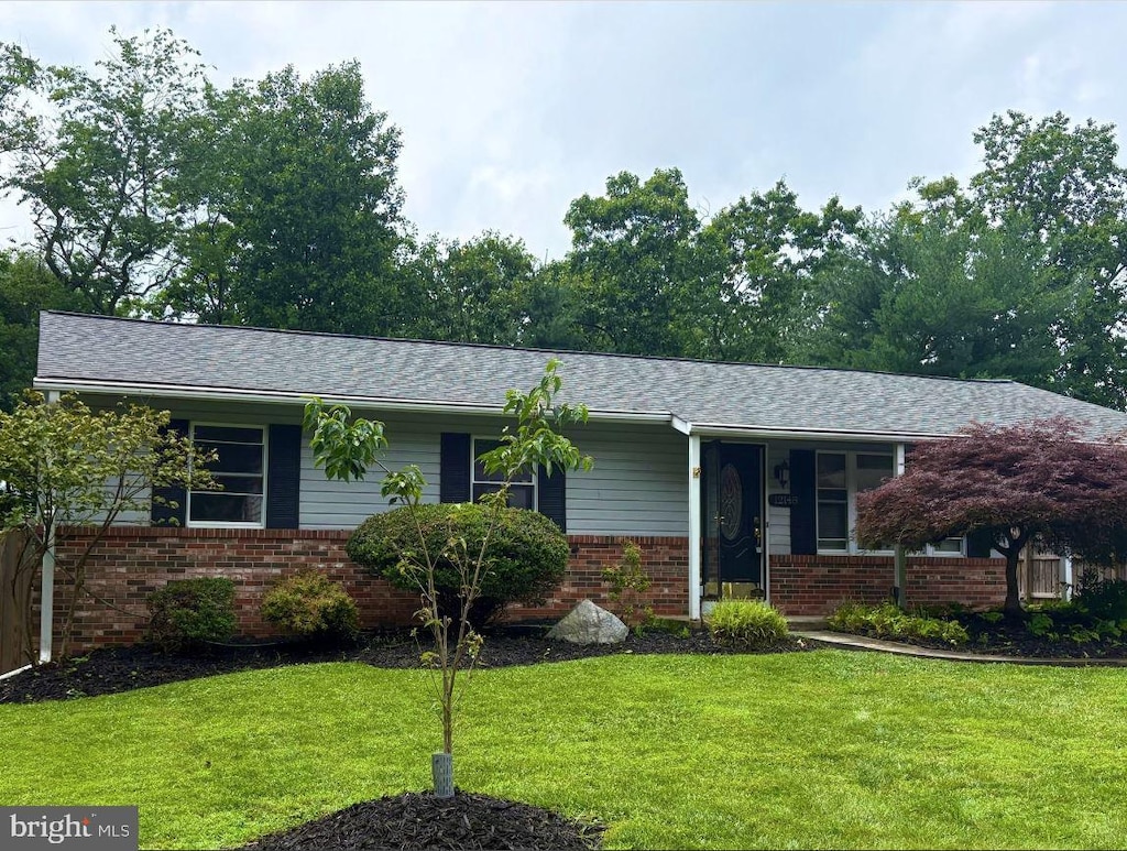 12148 Suffolk Ter, Gaithersburg, MD 20878 - ranch-style home featuring brick siding, a front yard, and roof with shingles