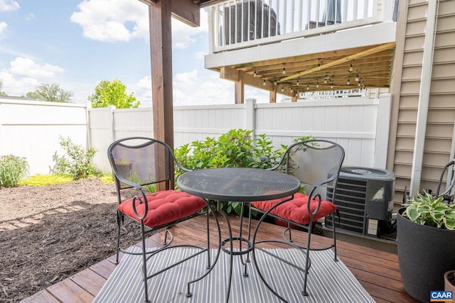 2140 Elm Tree Knl, Charlottesville, VA 22911 - wooden deck with a fenced backyard and outdoor dining area