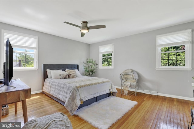 441 Barker Dr, West Chester, PA 19380 - bedroom with multiple windows, light wood-style flooring, and ceiling fan